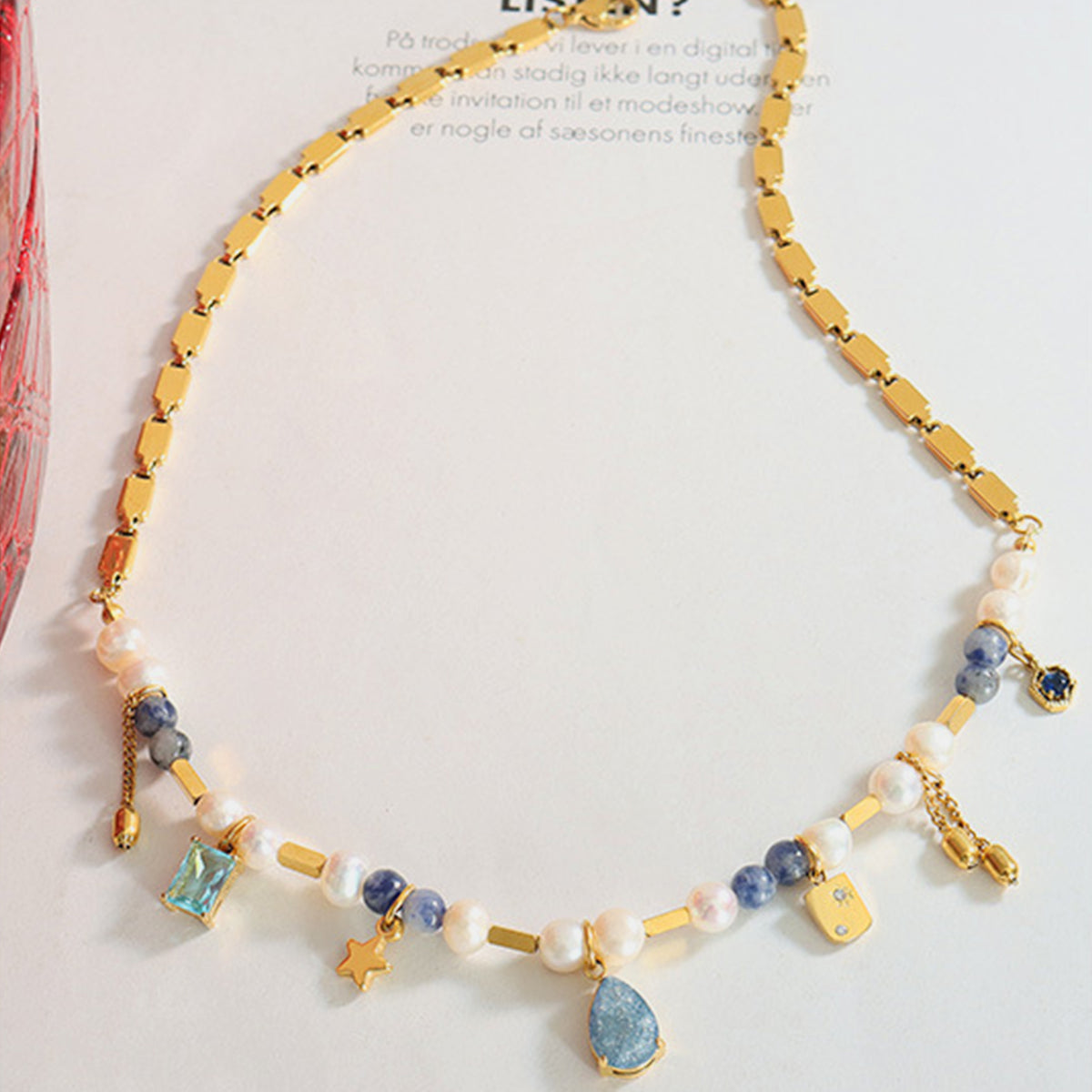 gold beaded charm necklace