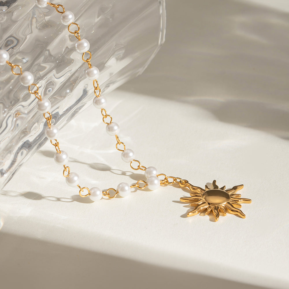 gold pearl sun pendant