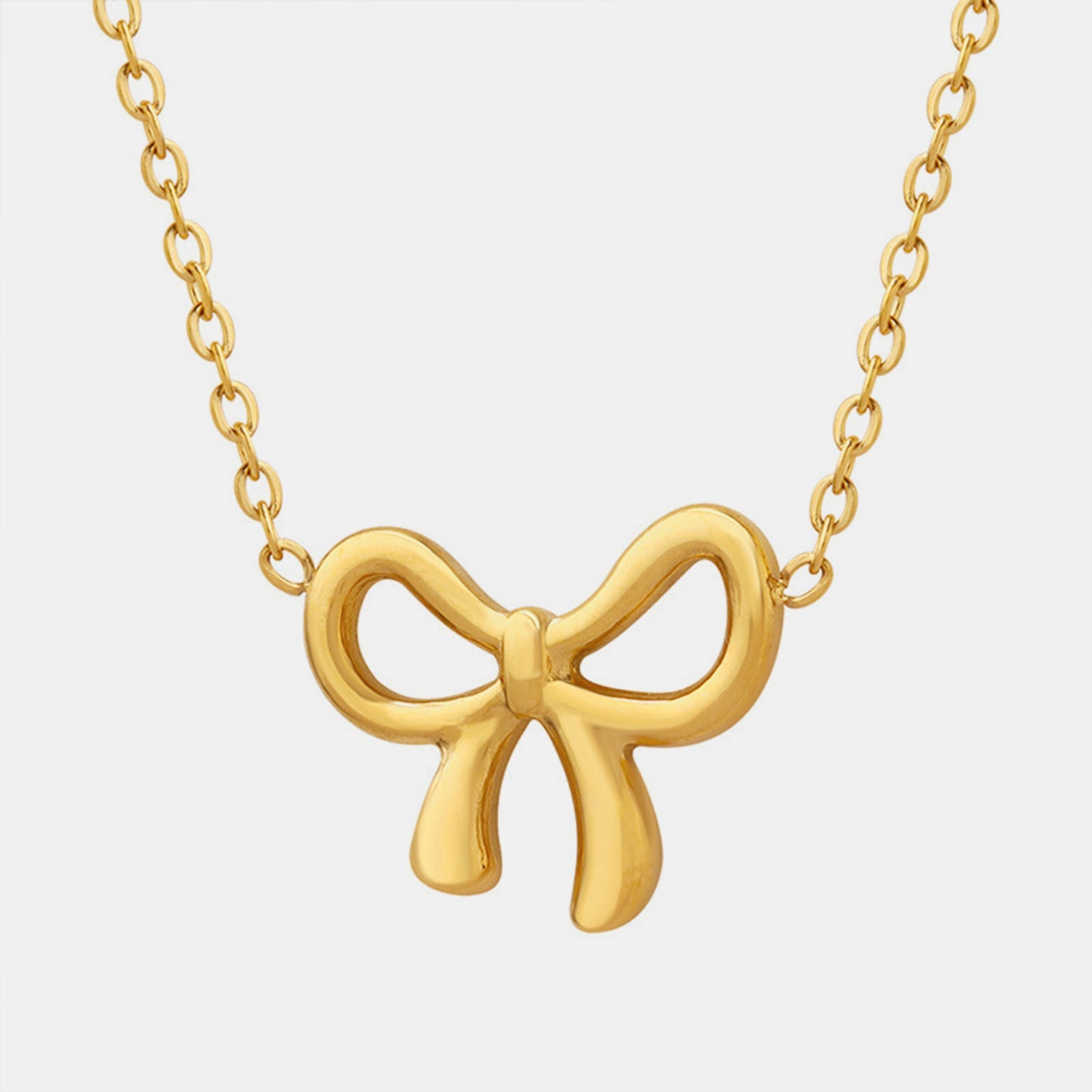 gold bow pendant necklace