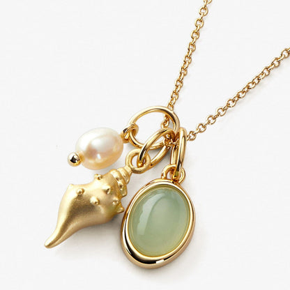 gold crystal conch pendant