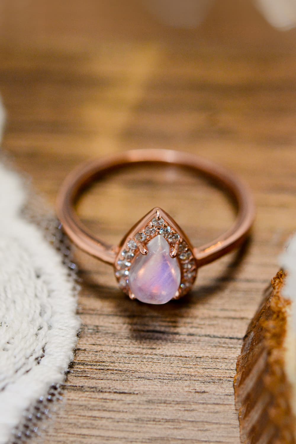 moonstone halo teardrop ring