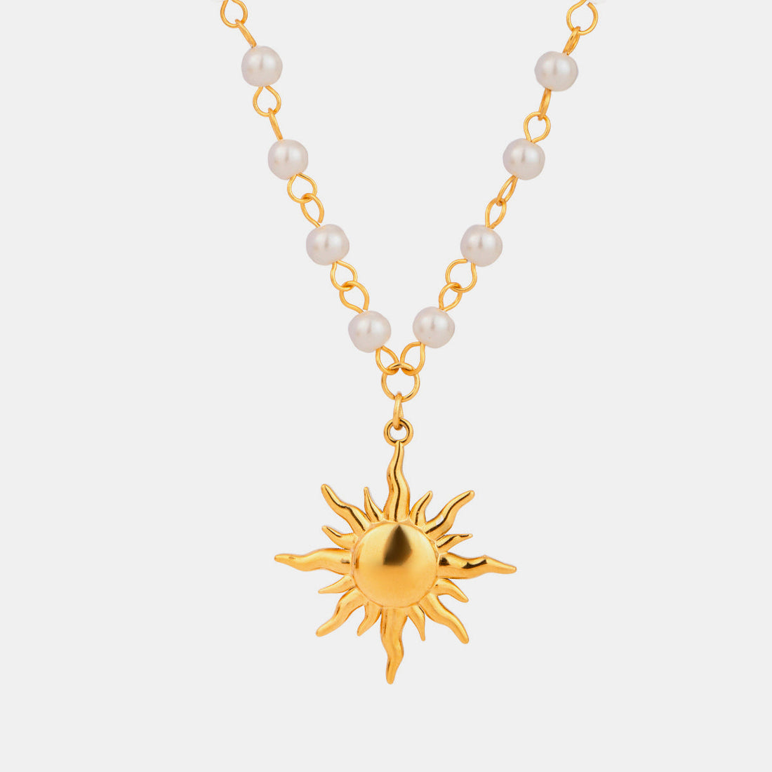 gold pearl sun pendant