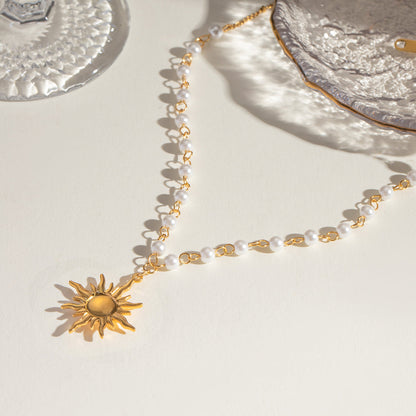 gold pearl sun pendant